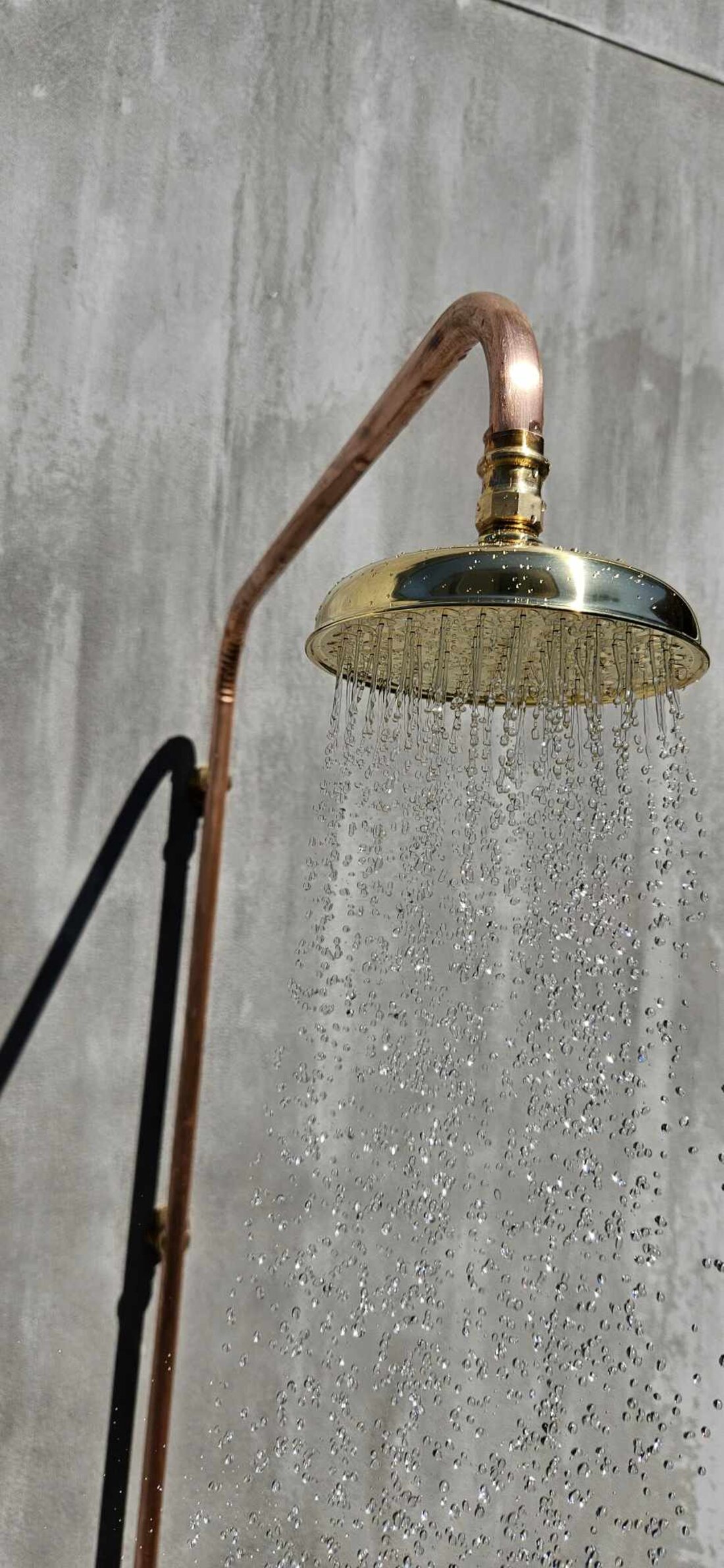 Hand made brass and copper outdoor shower running
